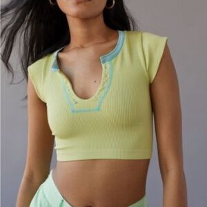 YELLOW AND BLUE GO FOR GOLD SEAMLESS CROP TOP URBAN OUTFITTERS